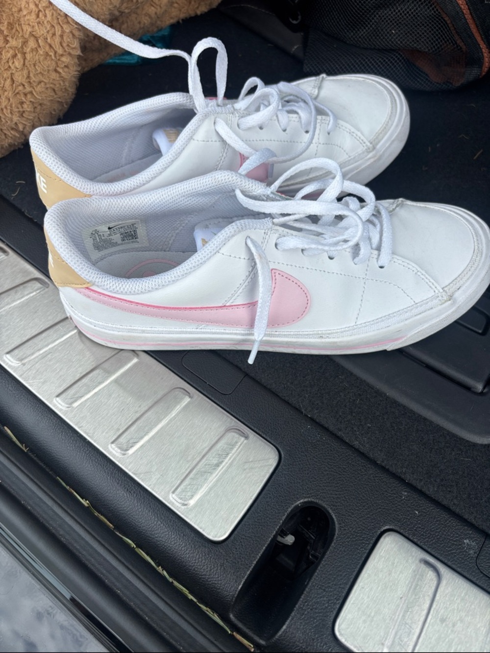 Nike Kids White Sneakers with Pink Swoosh and Tan Heel